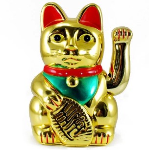 A estatueta de um gato Maneki neko