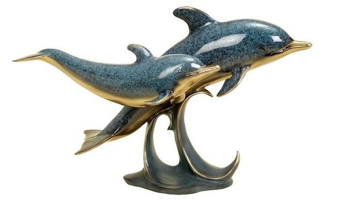 golfinhos em forma de amuleto de amor